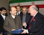 Vittorio di dio director of external relations at veronafiere presents the award to the consul general of the islamic republic of iran amir masud miri